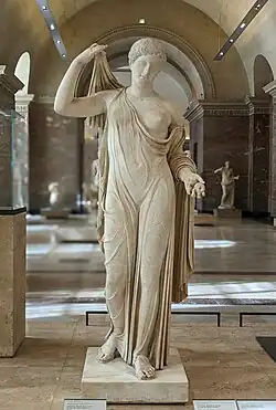 Statue of Aphrodite with short hair and light drapery