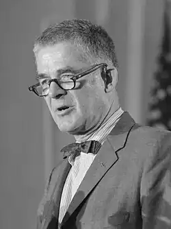Archibald Cox in a suit and bow-tie