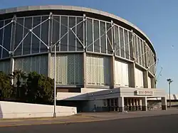 An arena is situated behind a road.