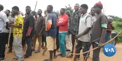 Several young men with a variety of weapons, including bows, spears, slings, and guns