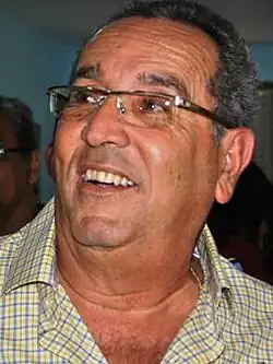 Headshot of Alemán in an indoors environment