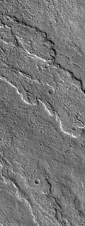 Mars Global Surveyor Mars Orbital Camera (MOC) image of lobate lava flows on flank of Ascraeus Mons.