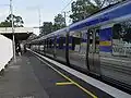 A comeng train (operated by connex) at the single platform station at Ashburton