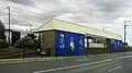 Station building and entrance to Platform 1 viewed from Nepean Highway, October 2021