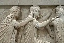Detail of the east frieze showing Eos, Artemis and Apollo in discourse