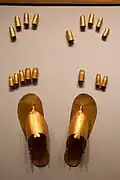 Egyptian finger and toe stalls, plus sandals, on display at the Metropolitan Museum of Art.