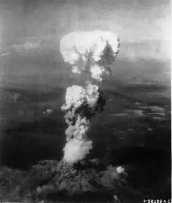 Black and white photo of a mushroom-shaped cloud