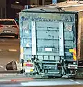 An upturned lion adjacent to the truck used in the 2017 attack