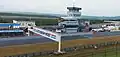 Main building, control tower and start line of Autodrom Most