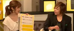Voice actors Aya Uchida and Megumi Ogata sit next to each other on an episode of the online variety show Say You to Yo Asobi in July 2018.