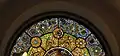 Stained glass window seen in exterior detail image