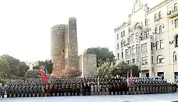 Ilham Aliyev and Recep Tayyip Erdogan posing with soldiers on the boulevard in 2018