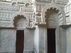 Peepal leaves on gavaksha arches