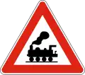 А33 Level crossing without barriers ahead
