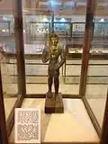 Bronze with gold statue of a Meroitic king as an archer