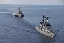 Independence-class littoral combat ship USS Mobile (LCS 26) sailing with BRP Ramon Alcaraz (PS 16).