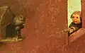 Water gun and owl on support