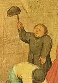 Twirling a hat on a stick