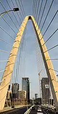 The tower (in the middle) is seen from Ba Son Bridge in February 2023