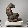 The animal is a male juvenile baboon (probably Papio Anubis) The head is padded with bandages. A rope-type element (probably twisted linen) was wrapped around it, followed by more textile, wrapping also around the whole body.[23]
