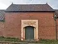 Back entrance, showing "A. Harris & Son, Pottery Works, 1873"