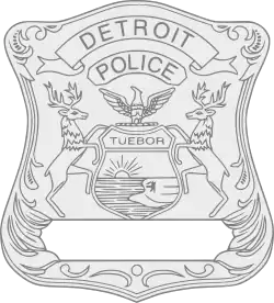 Badge of a DPD officer with badge number removed