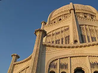 Image 24Symbols of many religions are carved in concrete relief on the exterior of the Bahá'í House of Worship in Wilmette. The temple was designed by the architect Louis Bourgeois and constructed between 1921 and 1953. Image credit: ctot_not_def (photographer), Tobias Vetter (upload) (from Portal:Illinois/Selected picture)