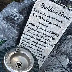 Water fountain and sign at the top