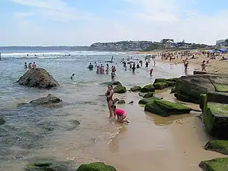 North end of Bar Beach viewing south over the natural rock pool, toward Merewether
