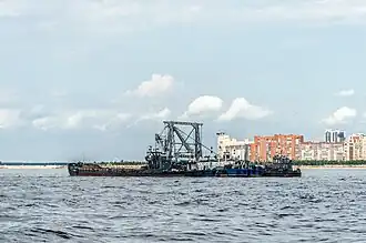 Dredge ship with barges on Neva bay in Saint Petersburg, Russia
