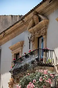 A typical baroque balcony with flowers