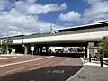 Elevated station passing over a street