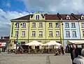 Facades of Nr.15 (yellow hue, left) and 17 (blue hue, right)