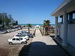 Parking area at the beach in the village of Toskatok