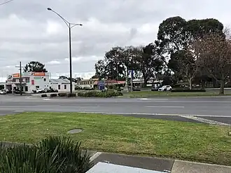 Old Princes Hwy, Beaconsfield. Facing the war cenotaph and behind it, the (now demolished) Old Post Office (the white weatherboard building).