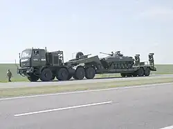 MZKT-74295 transporting a BMP-2