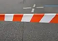 Red and white barricade tape