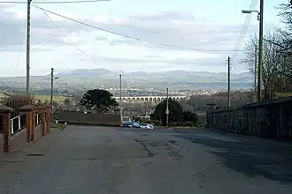 Craigmore Viaduct with the Mournes in the distance, seen from Bessbrook near Newry station