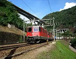 Re 420 and Re 620 pull a freight train on the Gotthard route