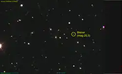A photograph of Bienor alongside several background stars and galaxies, seen by the Sloan Digital Sky Survey at Apache Point Observatory in 2004