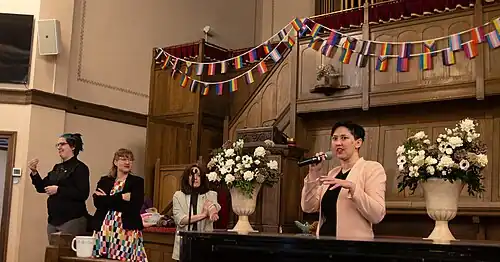 Minister speaking at the Big Gay Wedding event