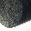 Gneiss sample bearing biotite and chlorite (green), a common alteration product of biotite