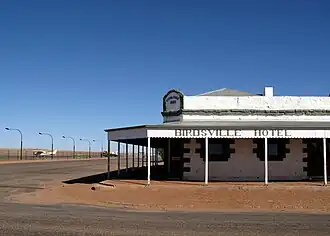 The Birdsville Hotel, adjacent to the apron of Birdsville Airport