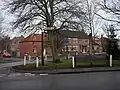 The bus stop bench and sign