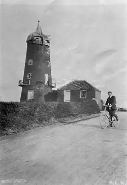 Black Mill, Waxholme taken in 1905 after the sails had been removed but before the top was removed by the army in WWI.