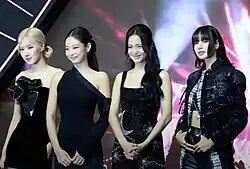 2NE1 smiling for the camera