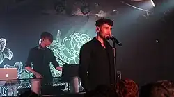 Blaqk Audio performing. From left to right: Jade Puget and Davey Havok.