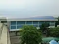 The Father Simpliciano Building that replaced the Old Gymnasium and Home Economics Building, that currently houses the new gymnasium, the senior high school, the libraries, senior high school Department office, faculty room and some classrooms