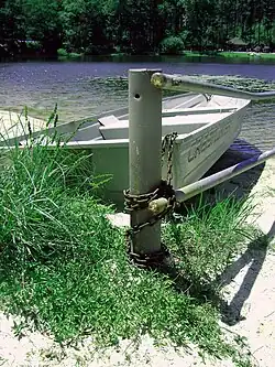 Boat tied to a dock on the lake