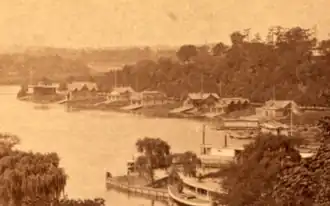 Boathouse Row (c. 1874-77), from left to right: #14; #11; #9–10; #7-8, #6; #4–5; and #2-3 just after #11 was built and before #12